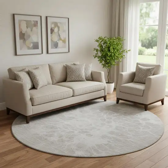 8' Taupe And Ivory Abstract Washable Round Rug With UV Protection Photo 1