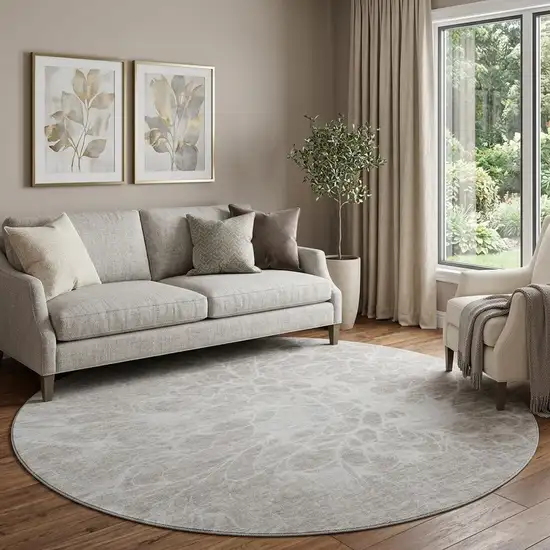 8' Taupe And Ivory Abstract Washable Round Rug With UV Protection Photo 1