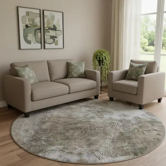 8' Taupe And Ivory Abstract Washable Round Rug With UV Protection Photo 1