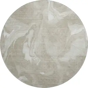 Photo of 8' Taupe And Ivory Abstract Washable Round Rug With UV Protection