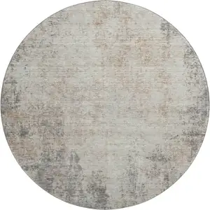 Photo of 8' Taupe And Ivory Abstract Washable Round Rug With UV Protection