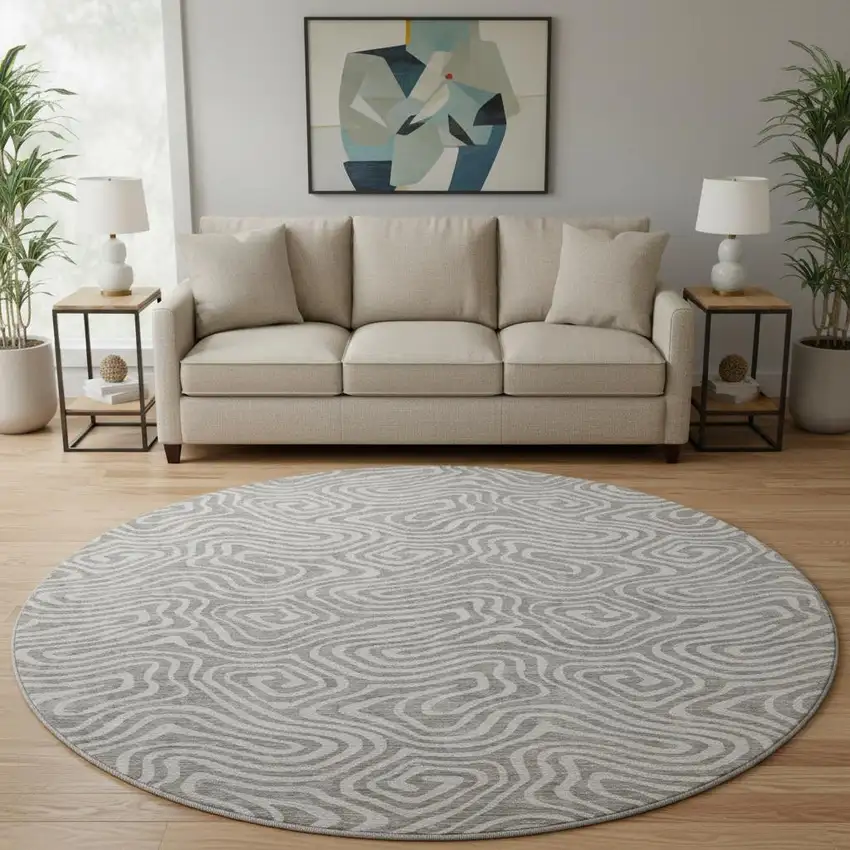 8' Taupe And Ivory Abstract Washable Round Rug With UV Protection Photo 2