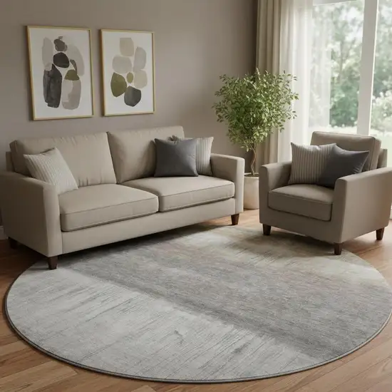 8' Taupe And Ivory Abstract Washable Round Rug With UV Protection Photo 2