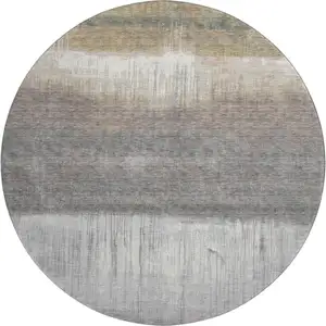 Photo of 8' Taupe And Ivory Abstract Washable Round Rug With UV Protection