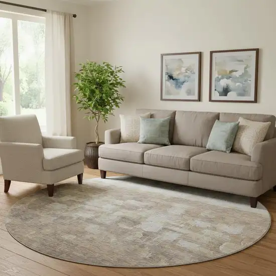 8' Taupe And Ivory Abstract Washable Round Rug With UV Protection Photo 2