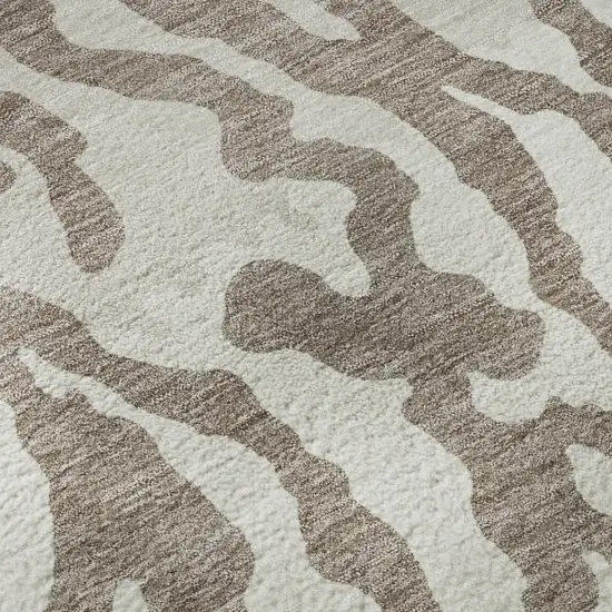 8' Taupe And Ivory Animal Print Washable Round Rug With UV Protection Photo 9