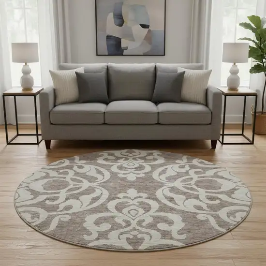 8' Taupe And Ivory Damask Washable Round Rug With UV Protection Photo 2