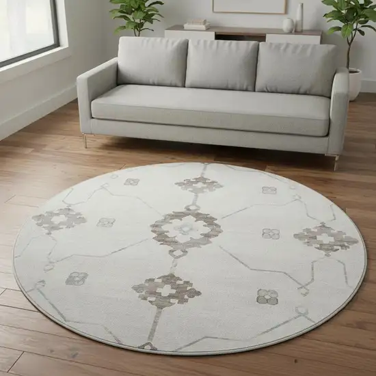 8' Taupe And Ivory Floral Medallion Washable Round Rug With UV Protection Photo 1