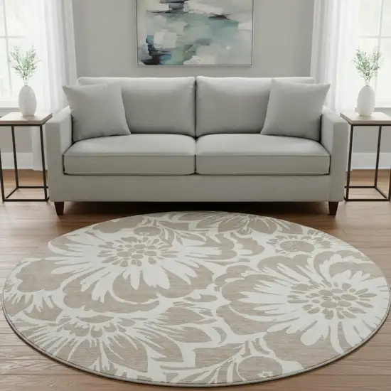 8' Taupe And Ivory Floral Washable Round Rug With UV Protection Photo 1