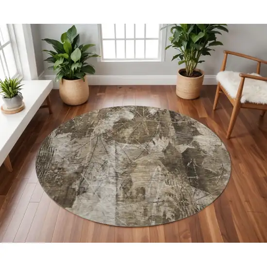 8' Taupe And Ivory Floral Washable Round Rug With UV Protection Photo 2