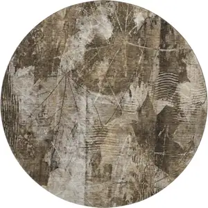 Photo of 8' Taupe And Ivory Floral Washable Round Rug With UV Protection