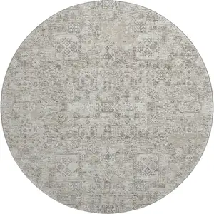 Photo of 8' Taupe And Ivory Floral Washable Round Rug With UV Protection