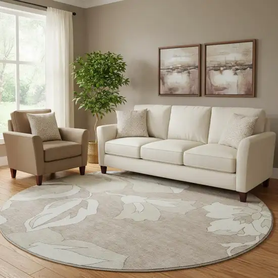 8' Taupe And Ivory Floral Washable Round Rug With UV Protection Photo 1