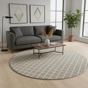 Photo of 8' Taupe And Ivory Geometric Washable Round Rug With UV Protection
