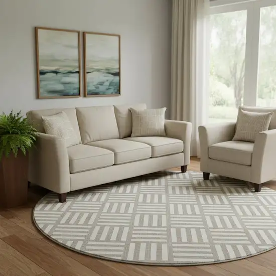 8' Taupe And Ivory Geometric Washable Round Rug With UV Protection Photo 1