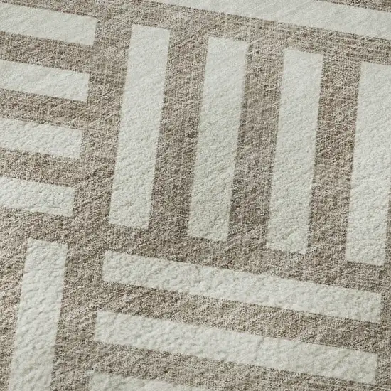 8' Taupe And Ivory Geometric Washable Round Rug With UV Protection Photo 9