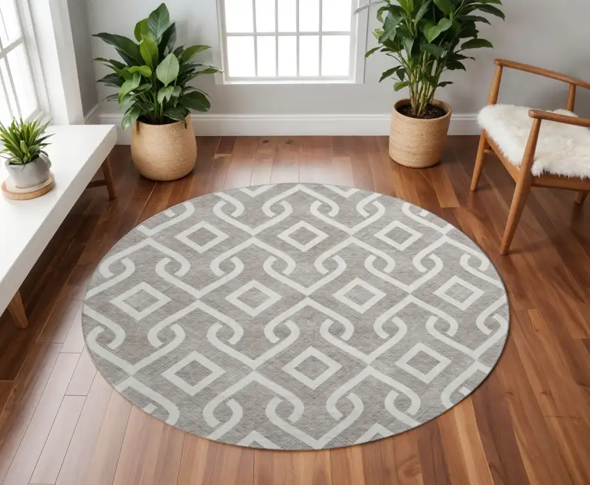 8' Taupe And Ivory Geometric Washable Round Rug With UV Protection Photo 2