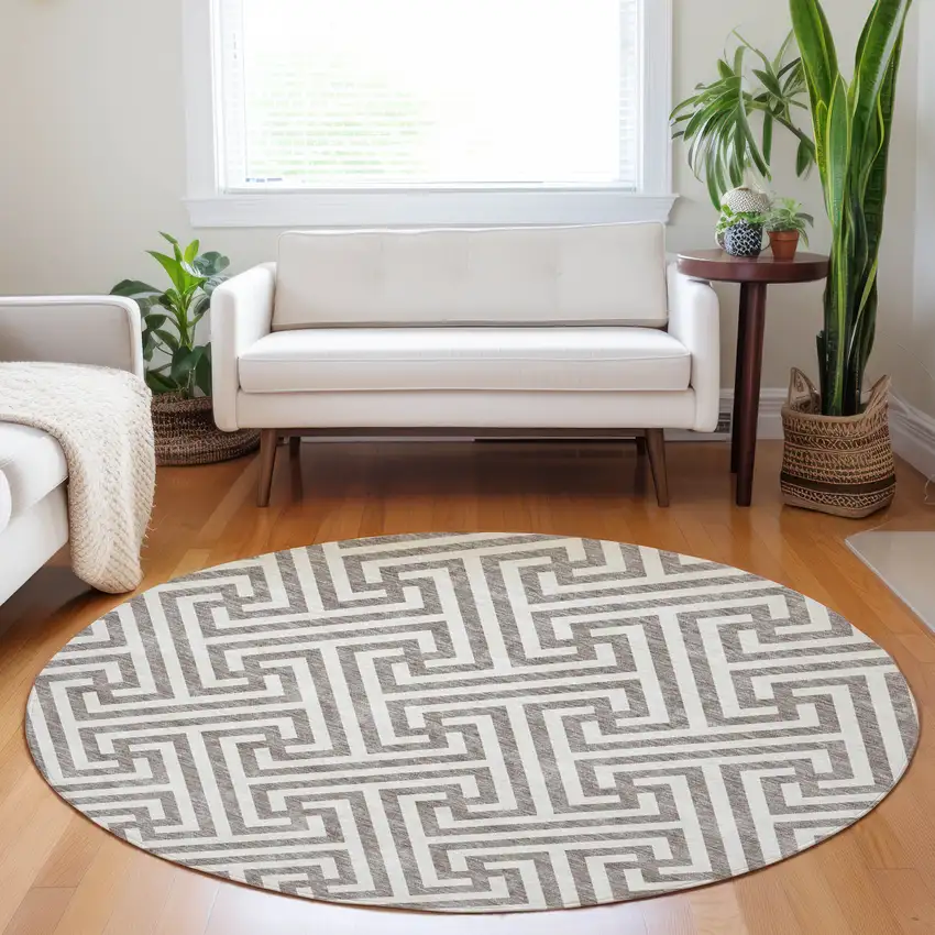 8' Taupe And Ivory Geometric Washable Round Rug With UV Protection Photo 5