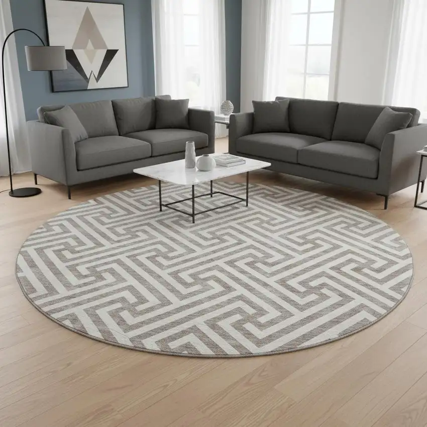 8' Taupe And Ivory Geometric Washable Round Rug With UV Protection Photo 2