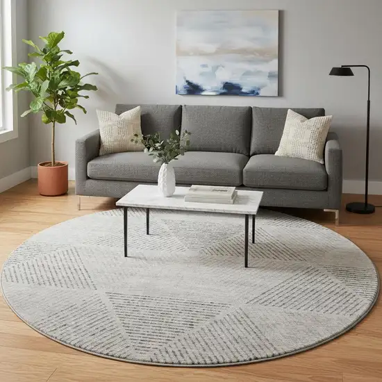 8' Taupe And Ivory Geometric Washable Round Rug With UV Protection Photo 2