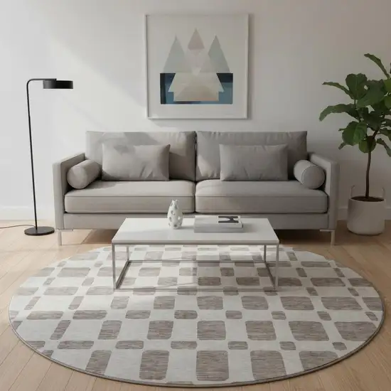8' Taupe And Ivory Geometric Washable Round Rug With UV Protection Photo 2