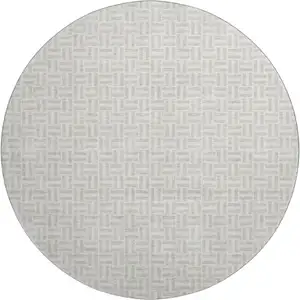 Photo of 8' Taupe And Ivory Geometric Washable Round Rug With UV Protection