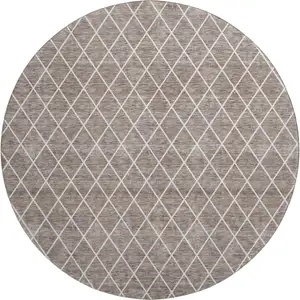Photo of 8' Taupe And Ivory Geometric Washable Round Rug With UV Protection