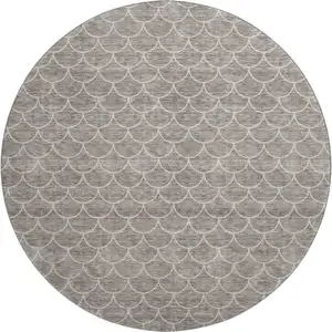 Photo of 8' Taupe And Ivory Geometric Washable Round Rug With UV Protection