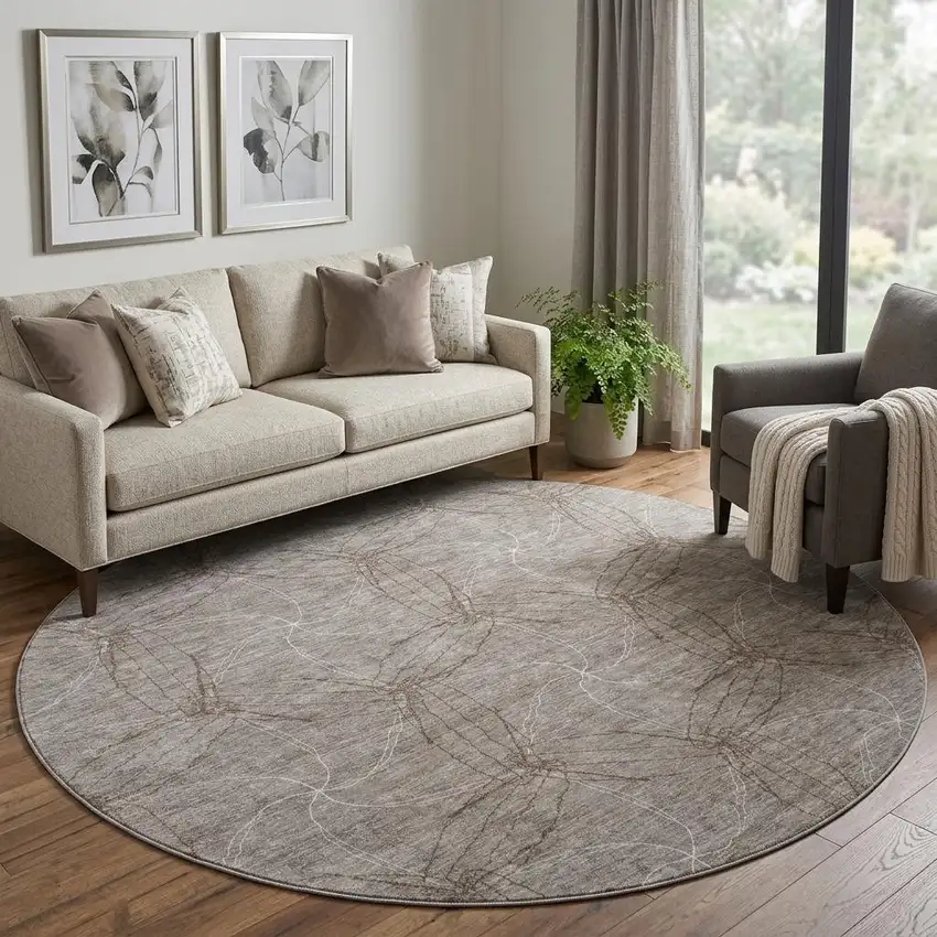 8' Taupe And Ivory Geometric Washable Round Rug With UV Protection Photo 1