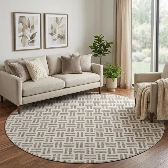 8' Taupe And Ivory Geometric Washable Round Rug With UV Protection Photo 1