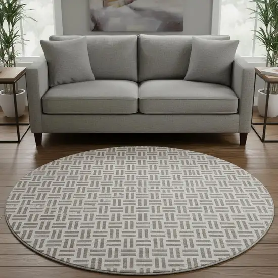 8' Taupe And Ivory Geometric Washable Round Rug With UV Protection Photo 2