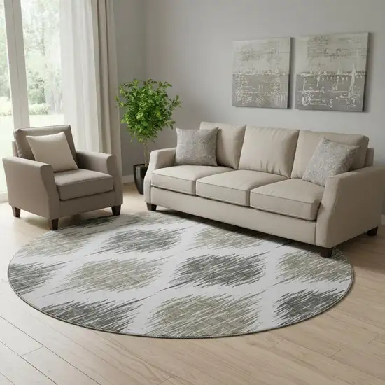 8' Taupe And Ivory Ikat Washable Round Rug With UV Protection Photo 1