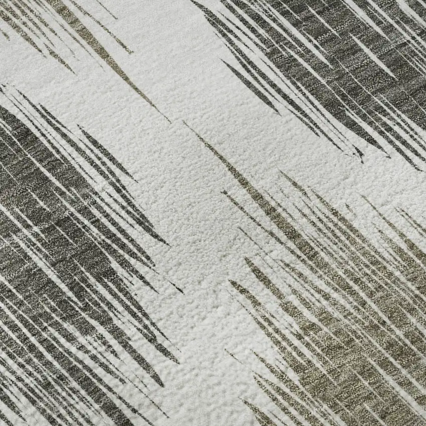 8' Taupe And Ivory Ikat Washable Round Rug With UV Protection Photo 9