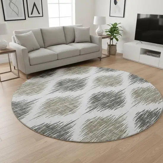 8' Taupe And Ivory Ikat Washable Round Rug With UV Protection Photo 2