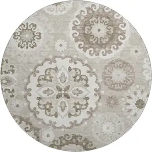 Photo of 8' Taupe And Ivory Medallion Washable Round Rug With UV Protection