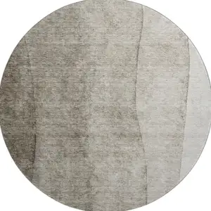 Photo of 8' Taupe And Ivory Ombre Washable Round Rug With UV Protection