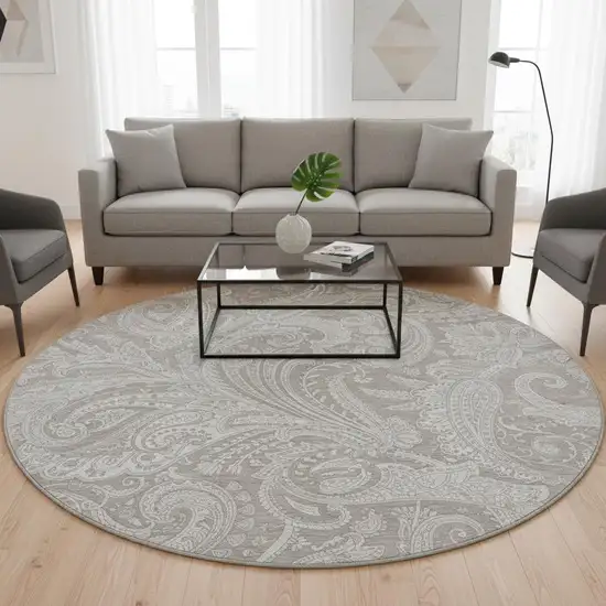 8' Taupe And Ivory Paisley Washable Round Rug With UV Protection Photo 2