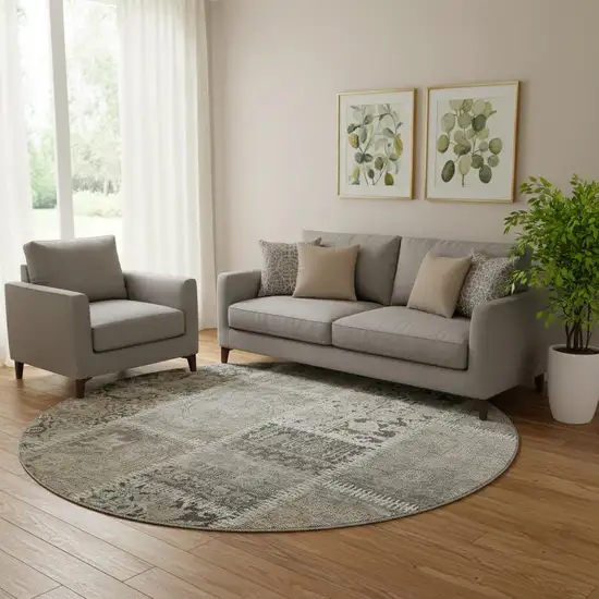 8' Taupe And Ivory Patchwork Washable Round Rug With UV Protection Photo 1