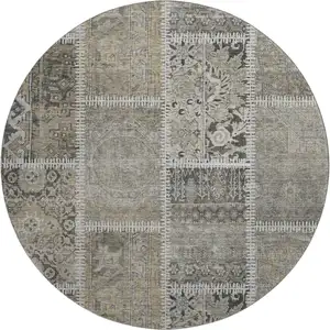 Photo of 8' Taupe And Ivory Patchwork Washable Round Rug With UV Protection