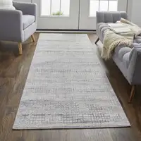 Photo of 8' Taupe And Ivory Plaid Power Loom Distressed Stain Resistant Runner Rug