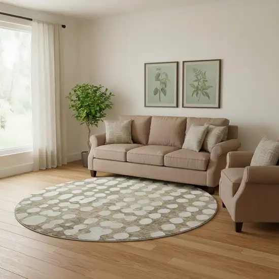 8' Taupe And Ivory Polka Dot Washable Round Rug With UV Protection Photo 1