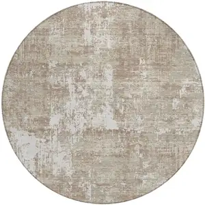 Photo of 8' Taupe And Ivory Round Abstract Washable Indoor Outdoor Area Rug