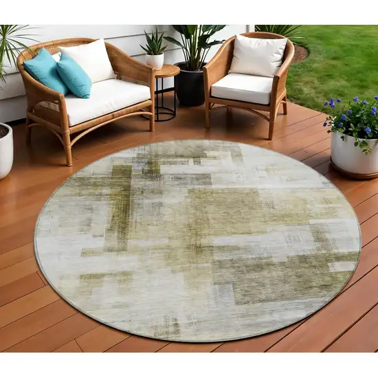 8' Taupe And Ivory Round Abstract Washable Indoor Outdoor Area Rug Photo 1