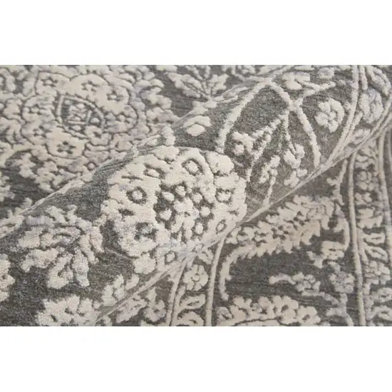 6' Taupe And Ivory Round Floral Power Loom Area Rug Photo 3