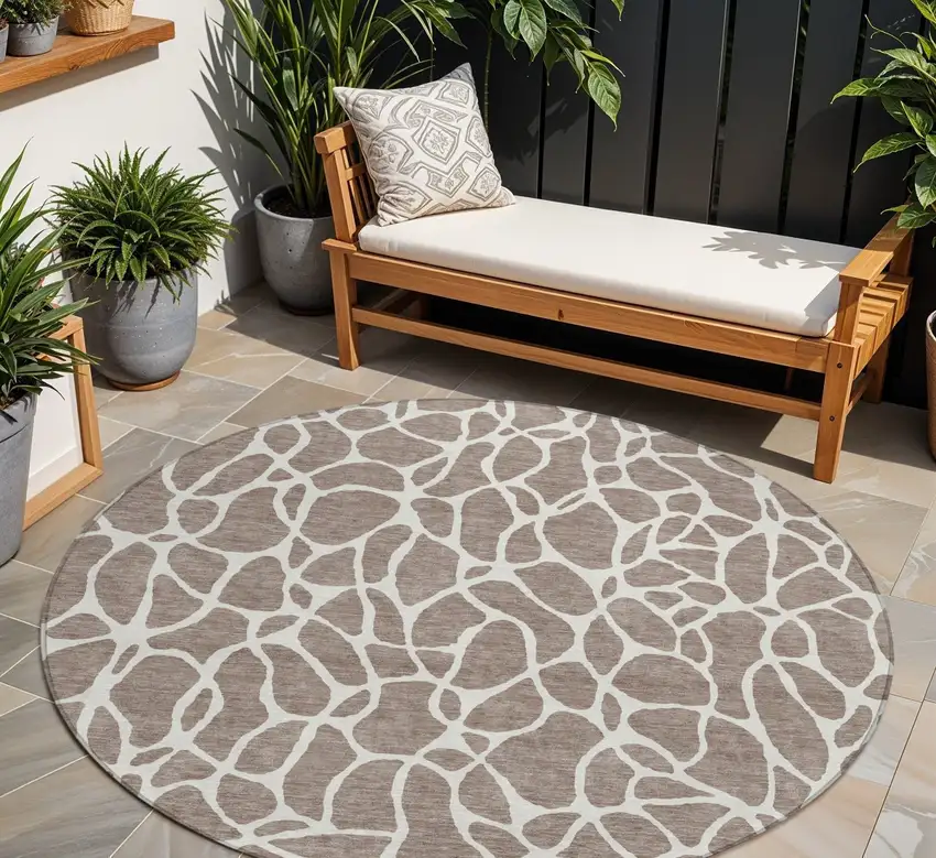 8' Taupe And Ivory Round Geometric Washable Indoor Outdoor Area Rug Photo 1