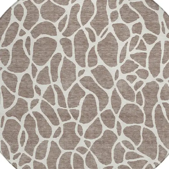 8' Taupe And Ivory Round Geometric Washable Indoor Outdoor Area Rug Photo 4