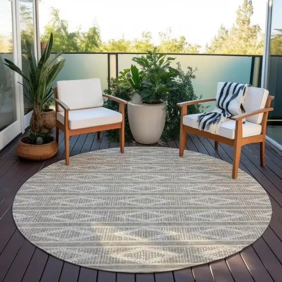 8' Taupe And Ivory Round Geometric Washable Indoor Outdoor Area Rug Photo 6