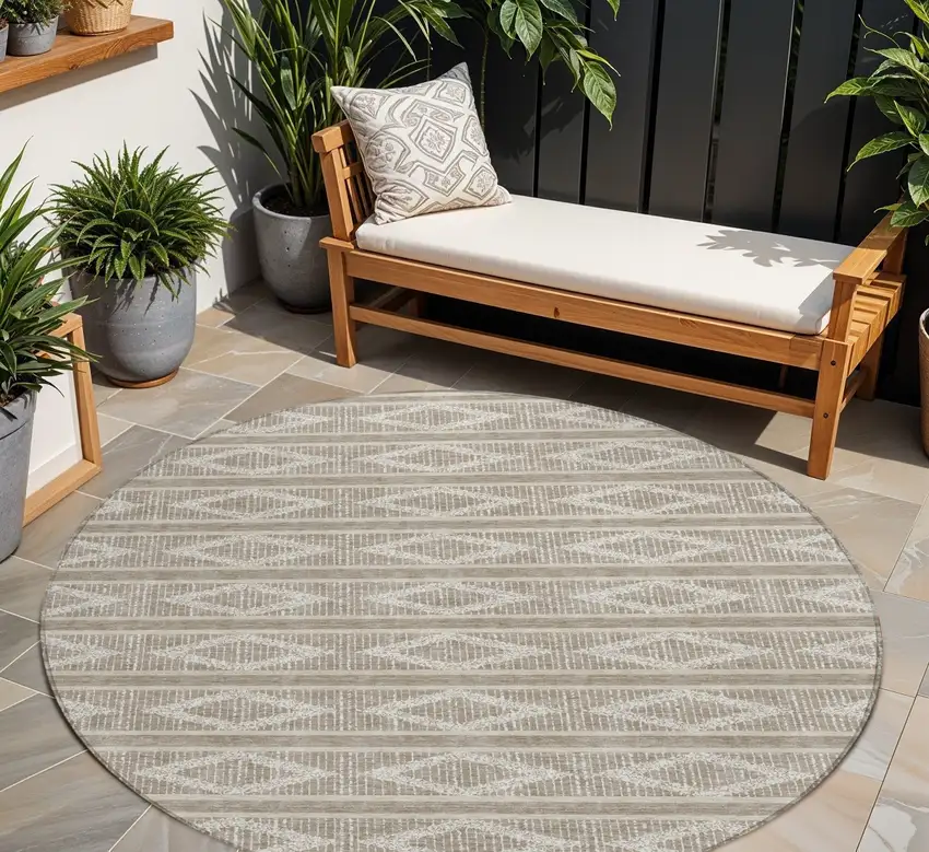 8' Taupe And Ivory Round Geometric Washable Indoor Outdoor Area Rug Photo 1