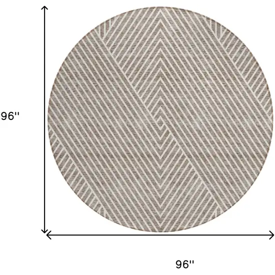 8' Taupe And Ivory Round Geometric Washable Indoor Outdoor Area Rug Photo 3