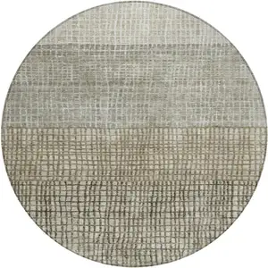 Photo of 8' Taupe And Ivory Round Geometric Washable Indoor Outdoor Area Rug